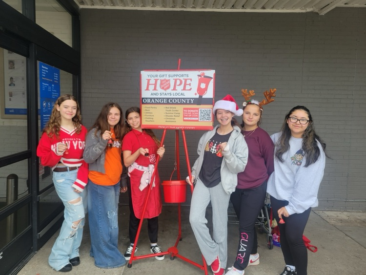 OJH STUCO members pose for a picture while ringing bells for the Salvation Army.