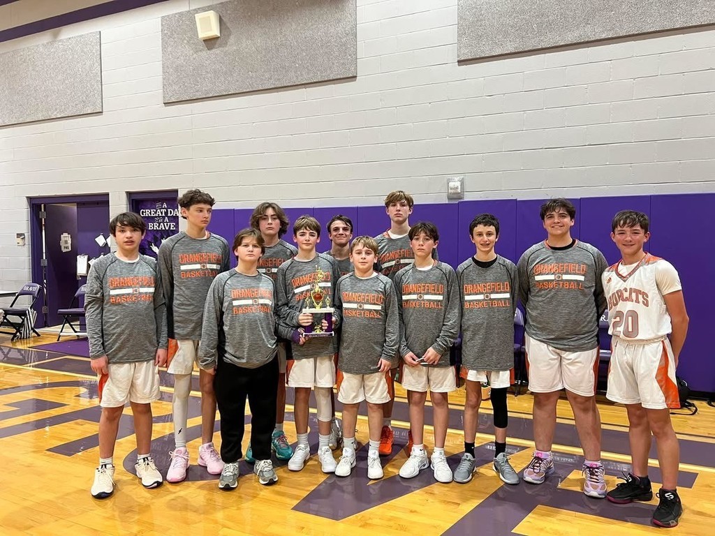 8th grade team poses a picture.