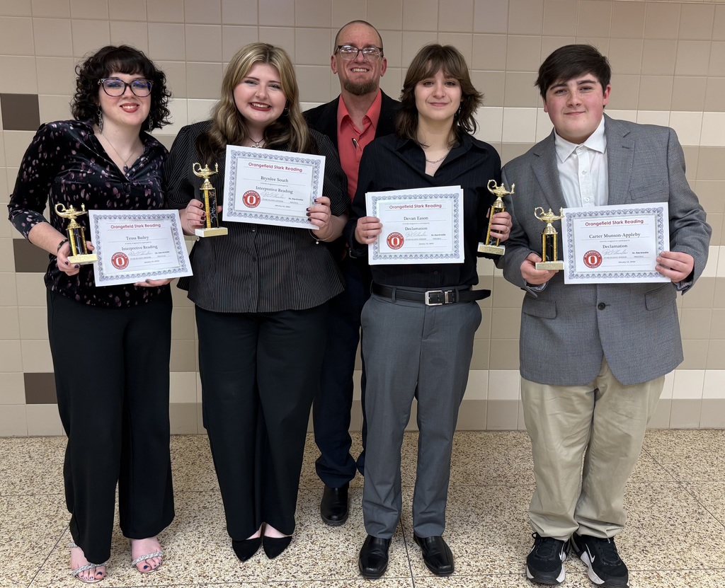 four students and sponsor with certificates and trophies
