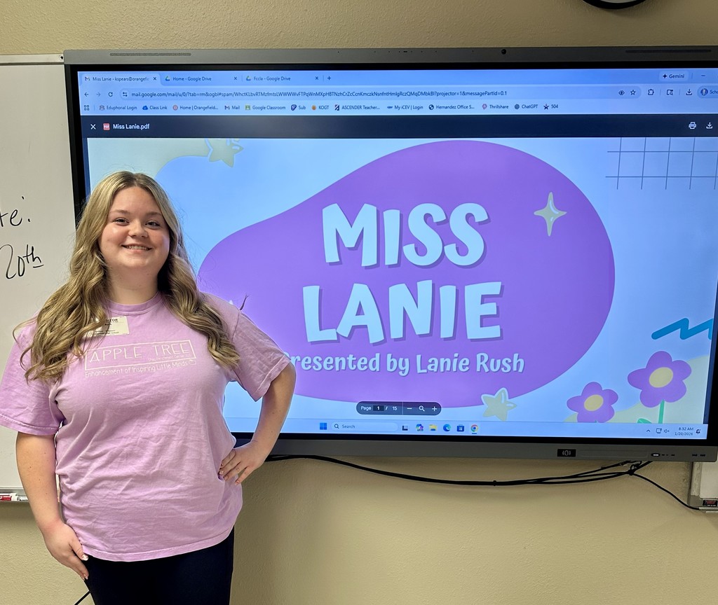 guest speaker in pink shirt by boxlight