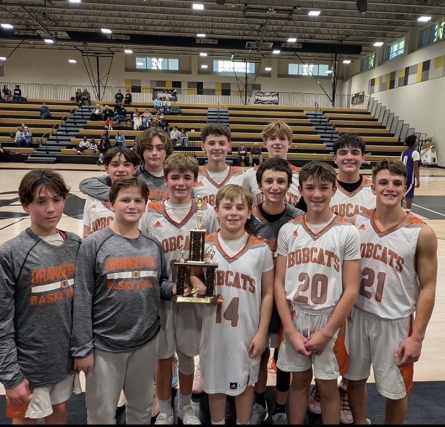 8th grade boys basketball pose for a picture at the Nederland tournament.