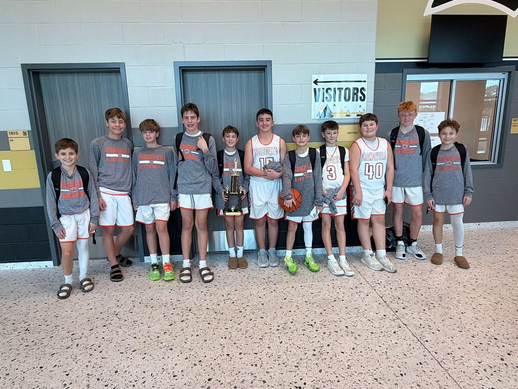 7th grade boys basketball pose for a picture at the Nederland tournament.