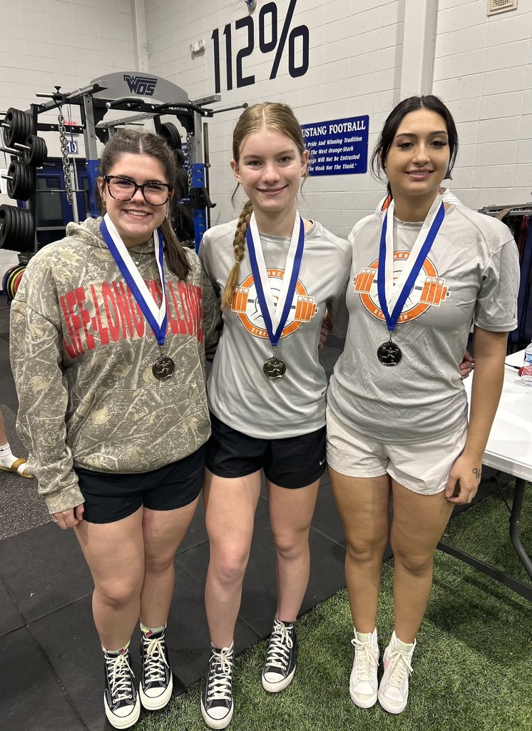 girls winner photos with medals.