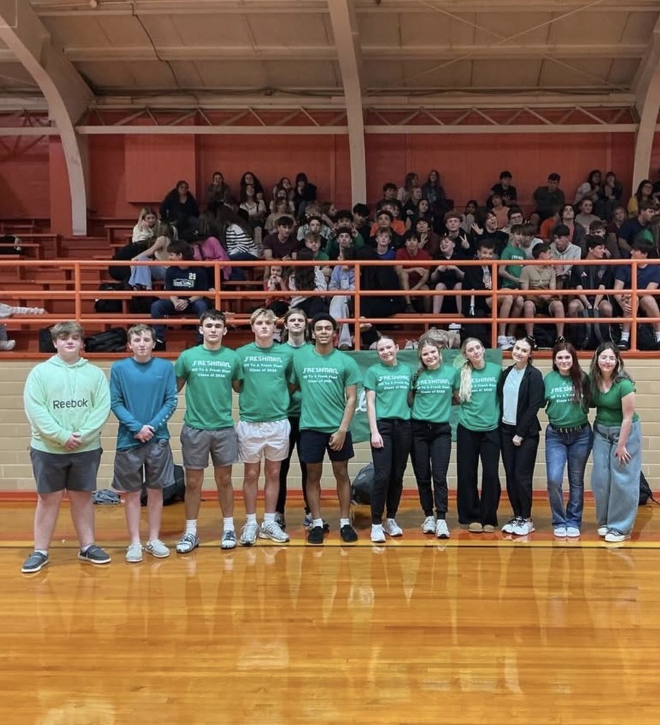freshman participants in green shirts