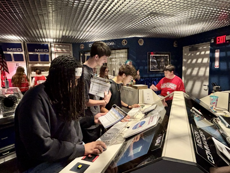 students operating a computer