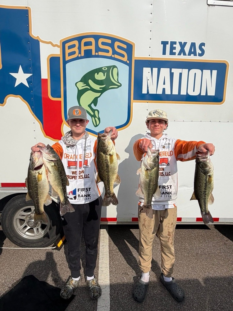 Collin and Brennon pose with their tournament winning fish.