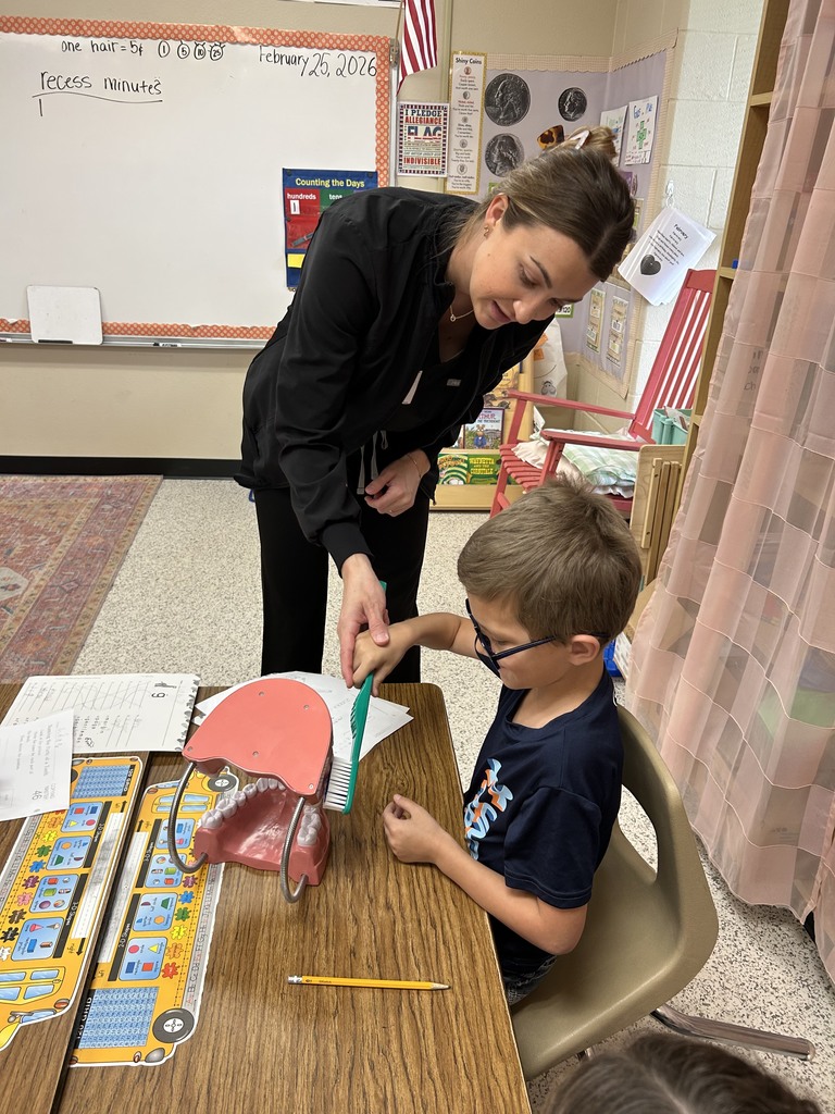 Dentist with Teeth and students