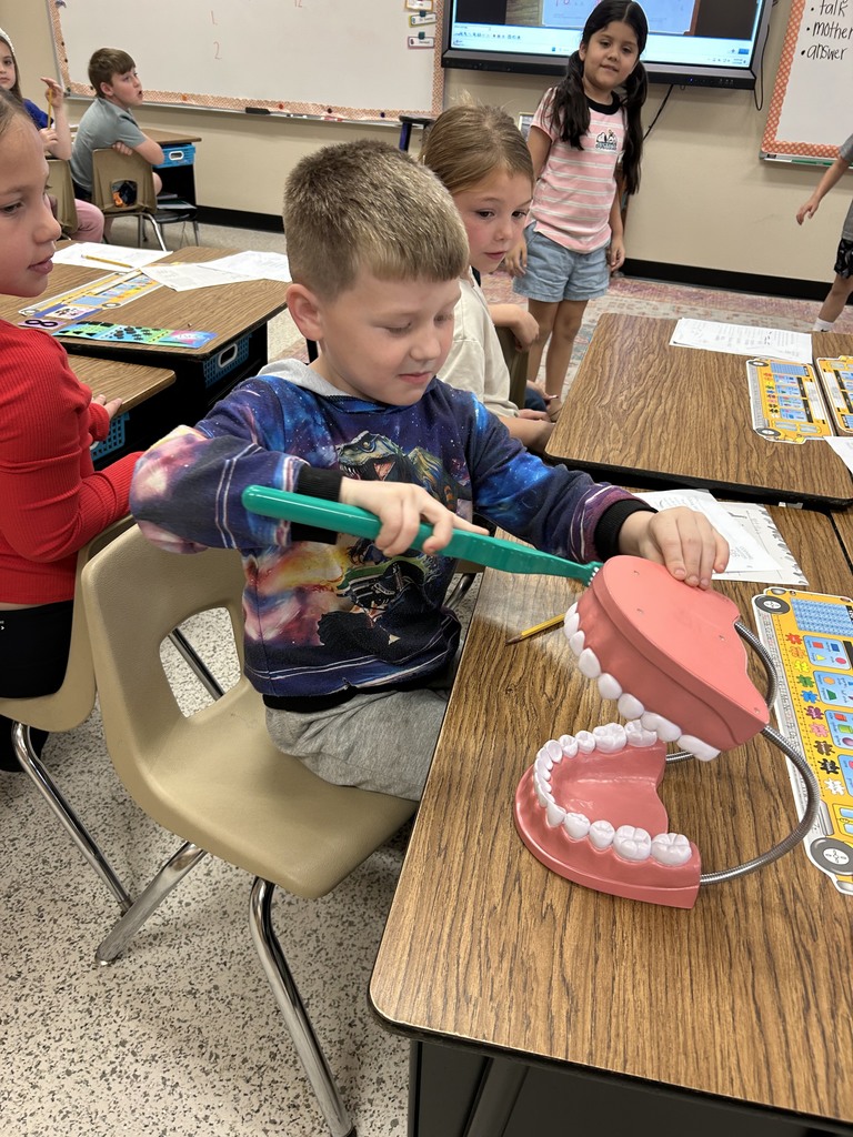 Dentist with Teeth and students