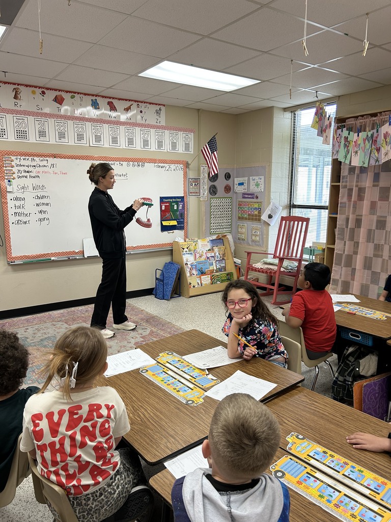 Dentist with Teeth and students