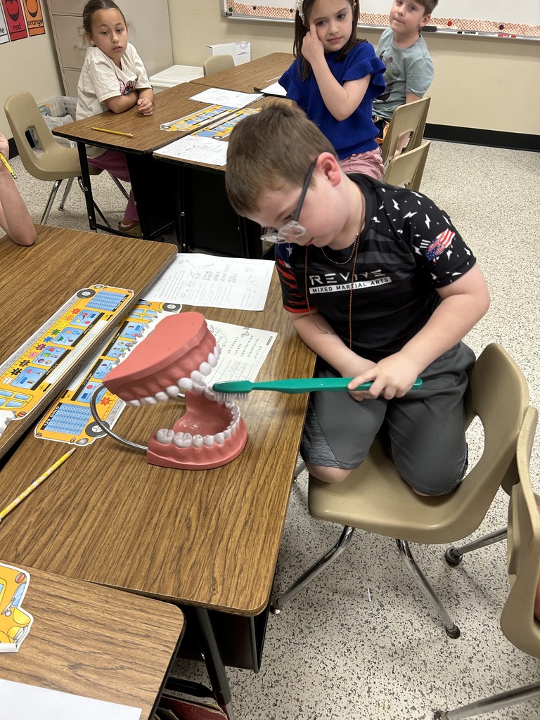 Dentist with Teeth and students