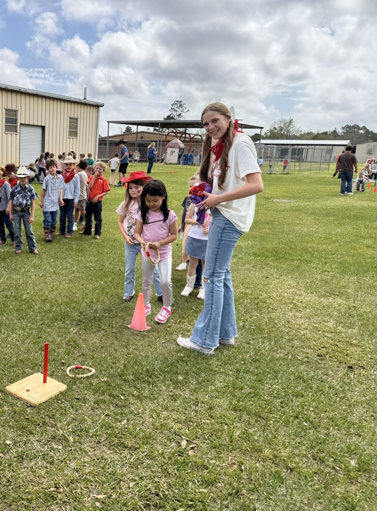 Children outside playing games. 