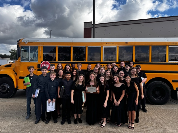 OJH Symphonic Band posing for a photo.