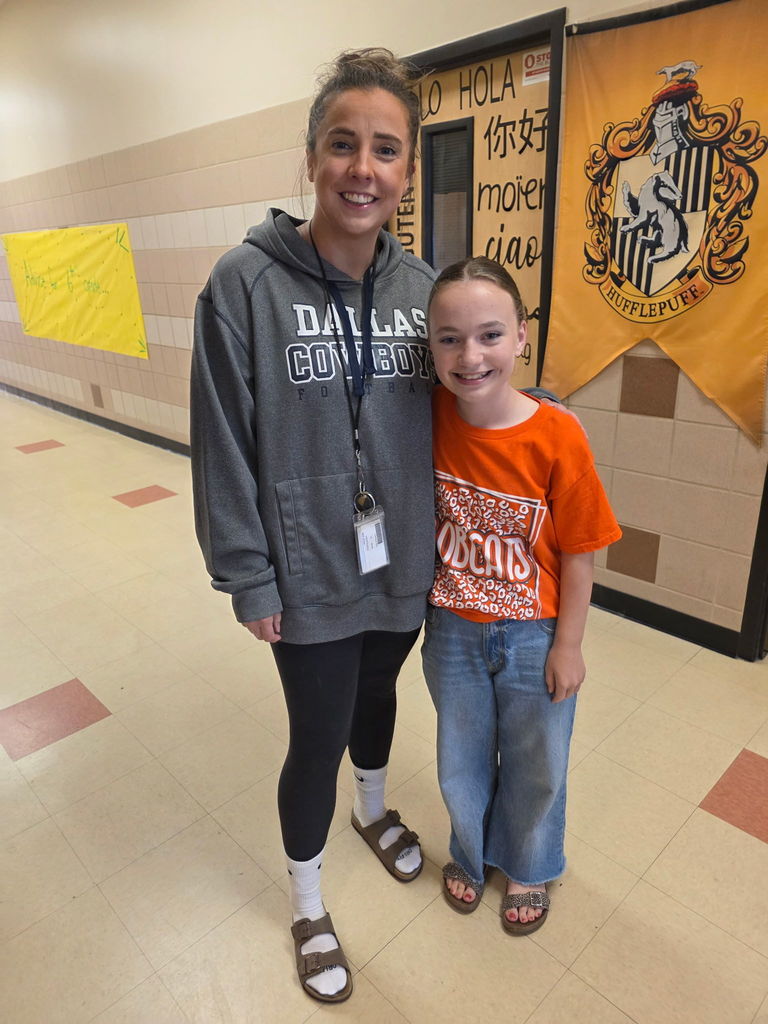 Teachers and students posing for swip swap day.