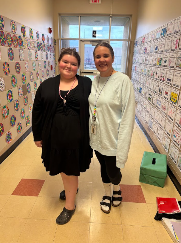 Teachers and students posing for swip swap day.
