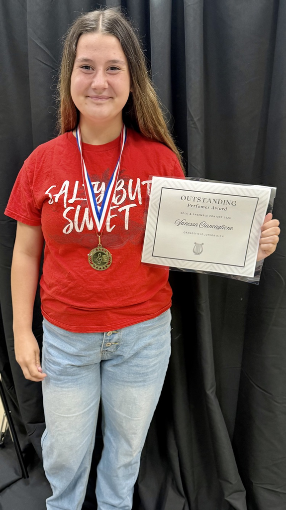 Vanessa Ciancaglione receiving a choir award.