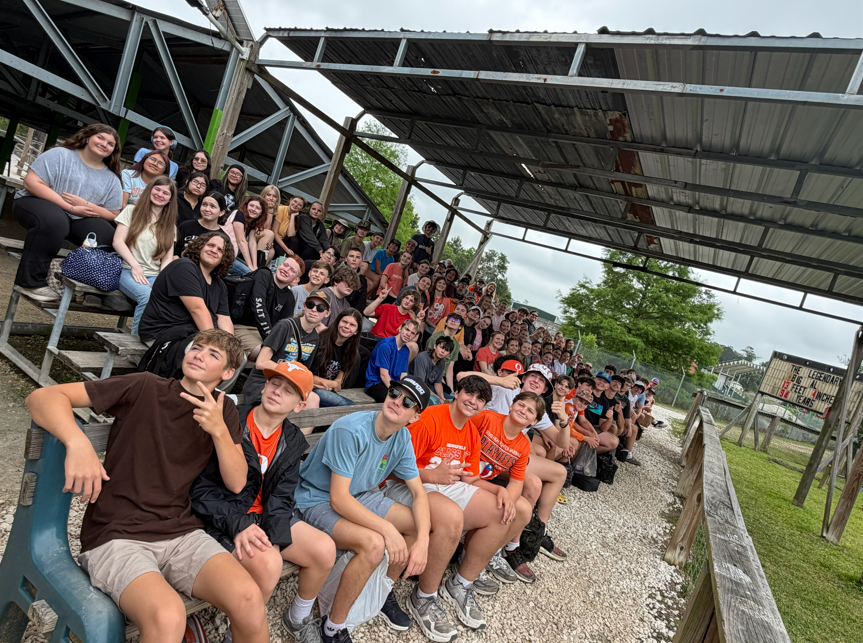 A group pictures of 8th graders on their field trip.