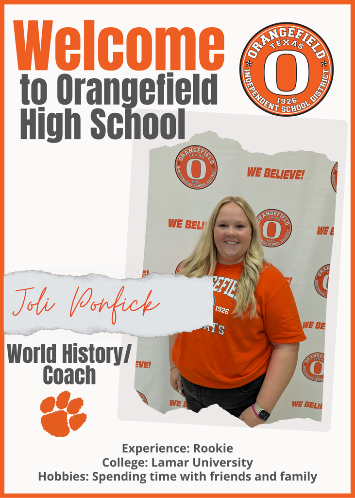 A smiling woman in an orange shirt stands against a backdrop featuring a school logo and text.