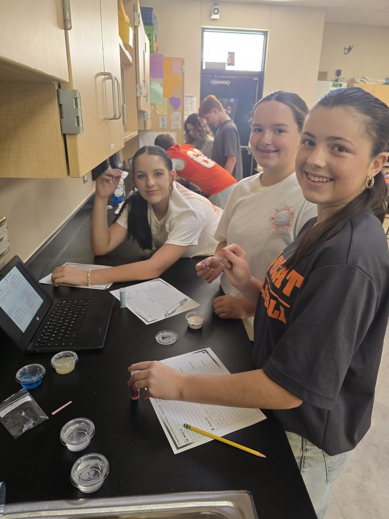 OJH 8th graders participating in an exciting science experiment.