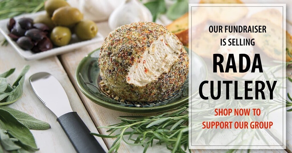A round cheese ball on a plate with a knife. Surrounding items include olives, rosemary, and garlic. Text overlays: "OUR FUNDRAISER IS SELLING RADA CUTLERY. SHOP NOW TO SUPPORT OUR GROUP."