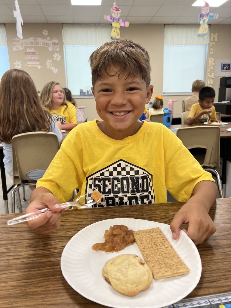 Students with Apple Day Snack