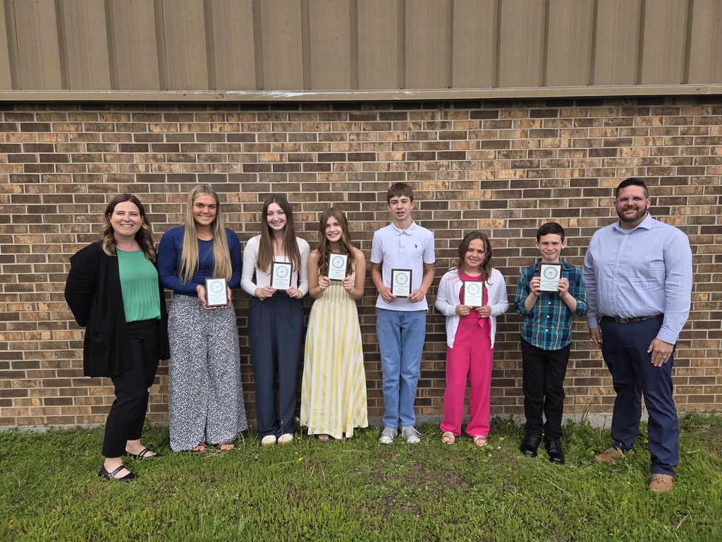 Six Orangeville students holding awards from the IPA, along with two principals