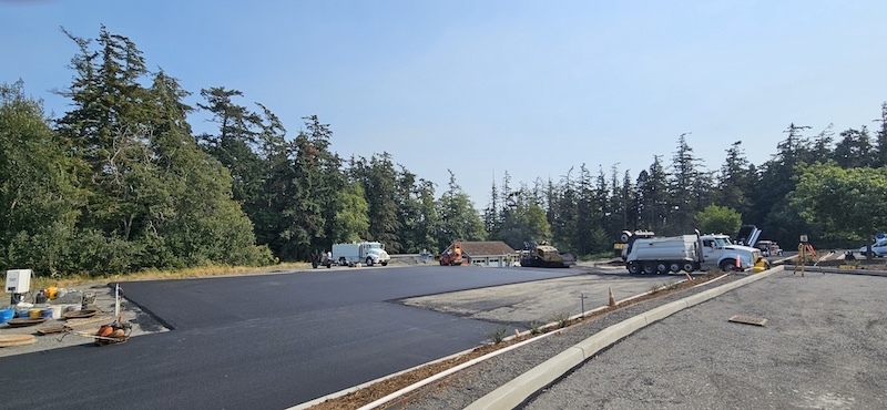 Image of trucks parked on new asphalt