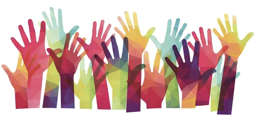 colorful hands raised
