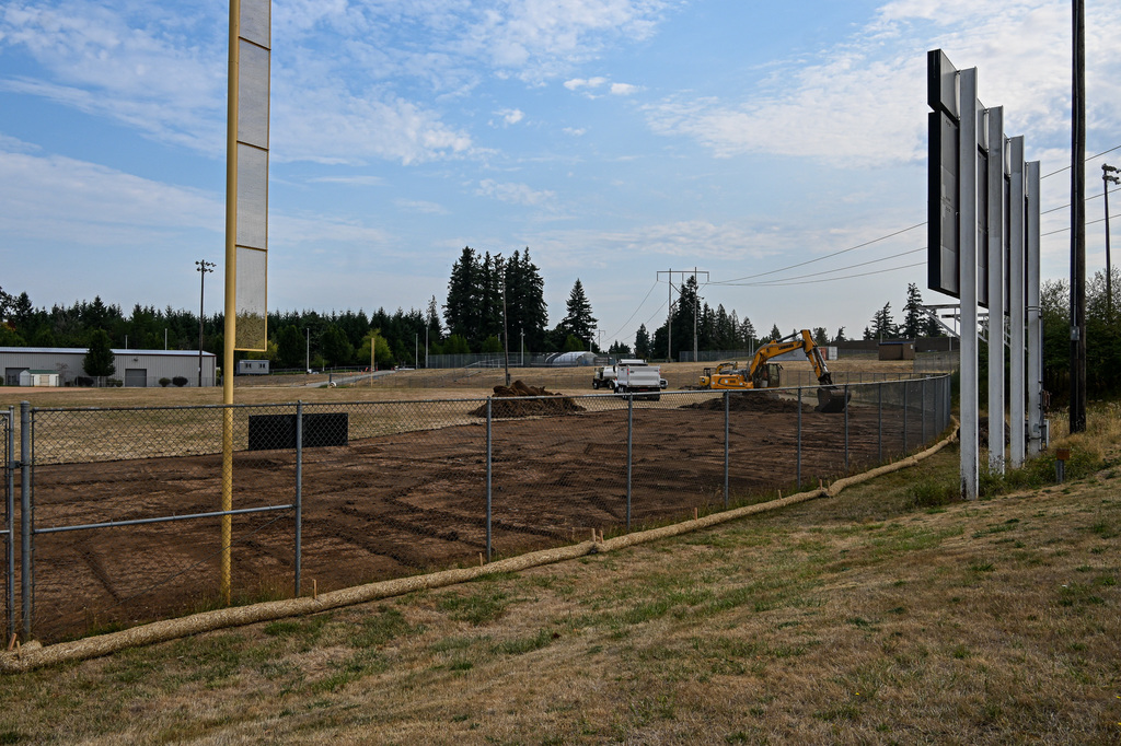 Dozer truck removing turf
