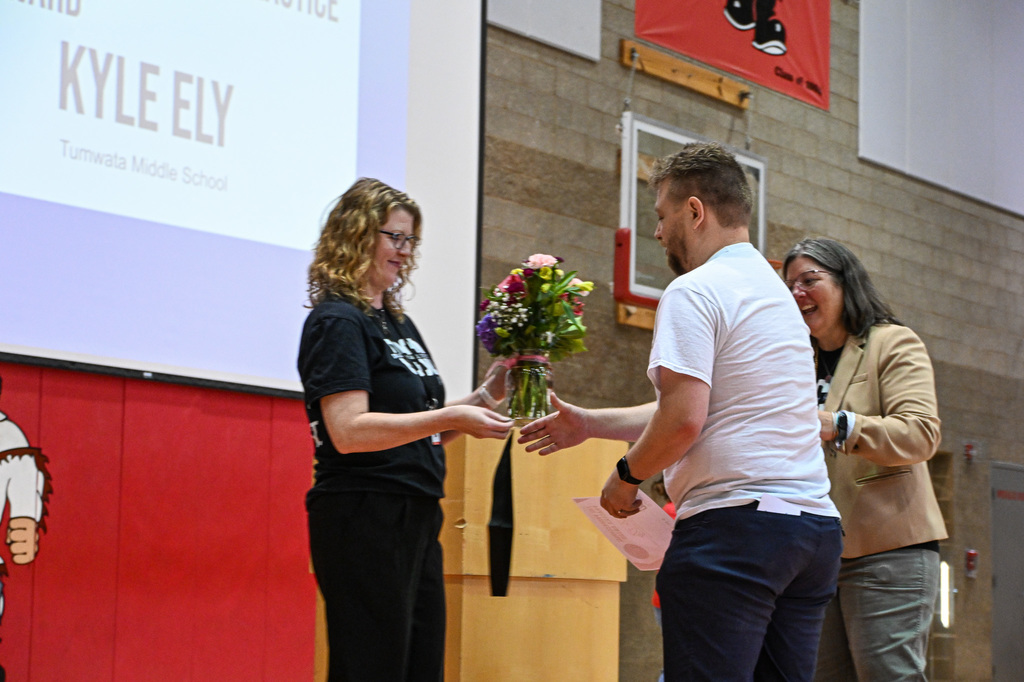 Kyle Ely accepting award