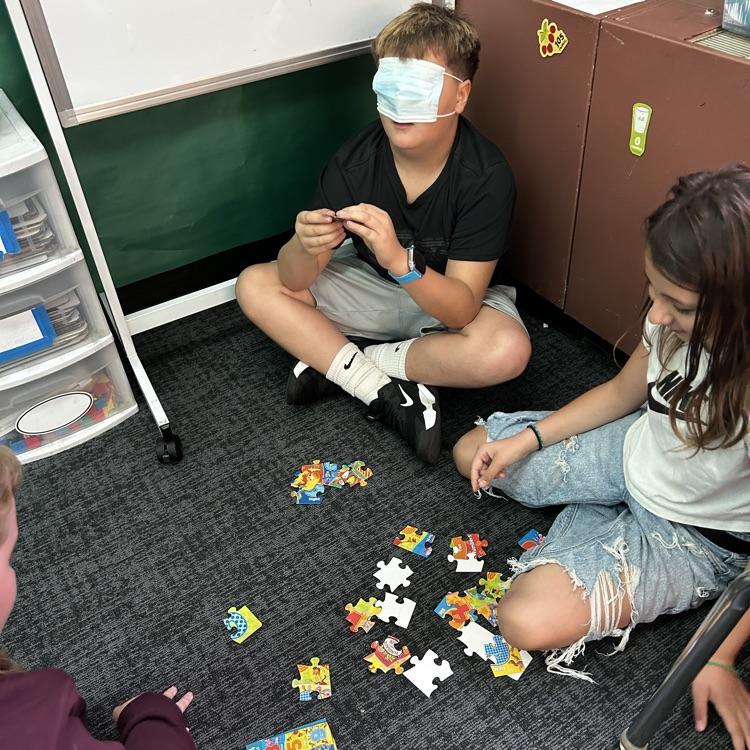 Students with puzzles