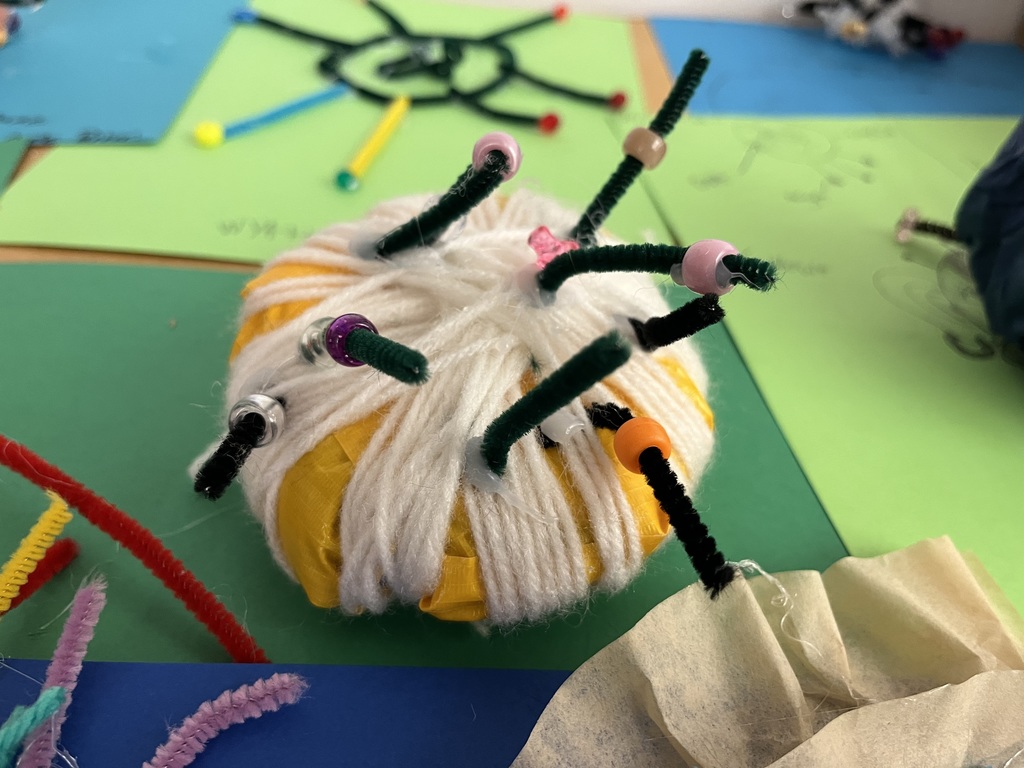 From bottle-cap capsids to pipe-cleaner spikes, these students turned science into art.