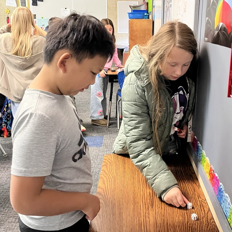 students play a math game