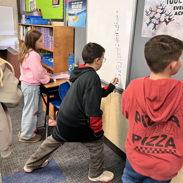 students play a math game