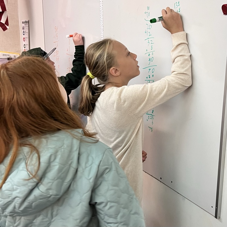 students play a math game