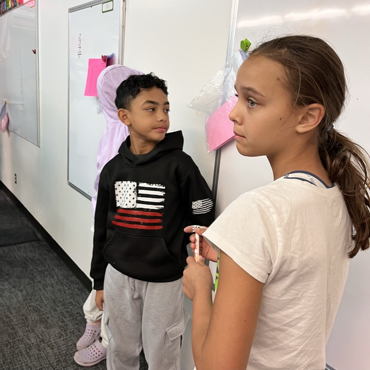 students play a math game