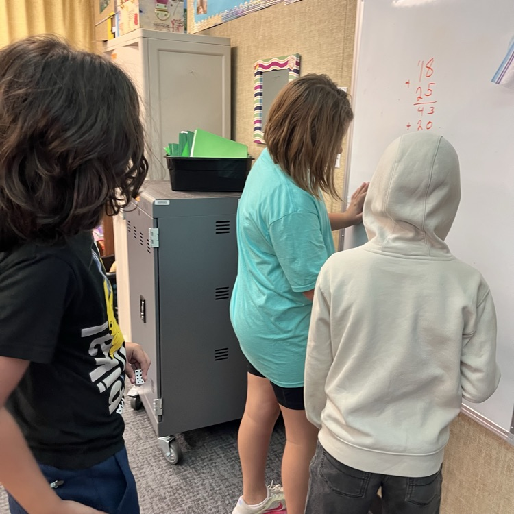 students play a math game