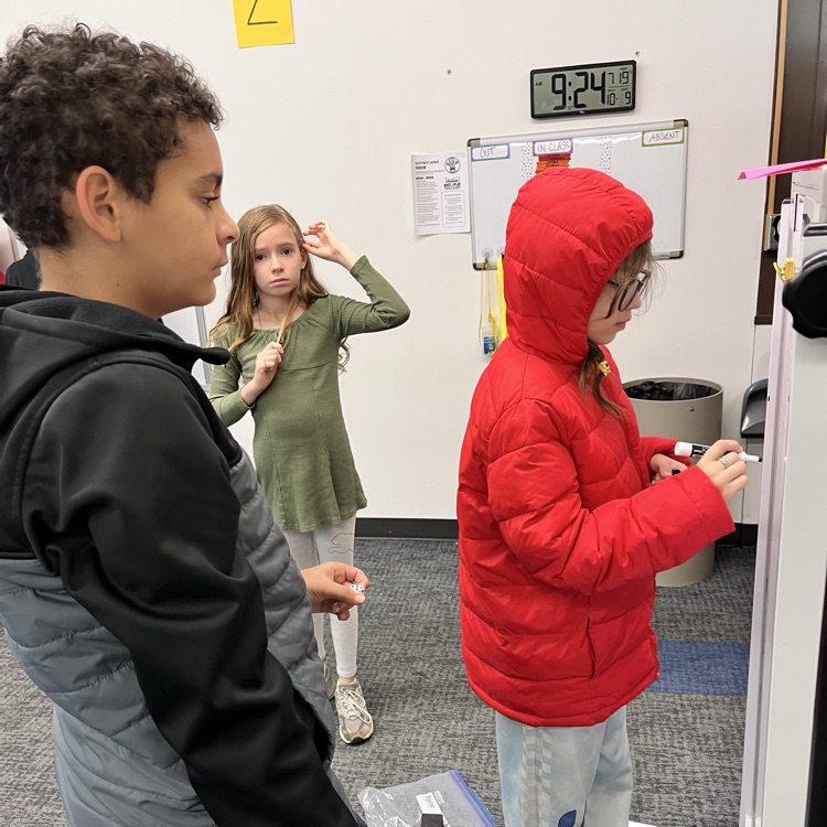 students play a math game