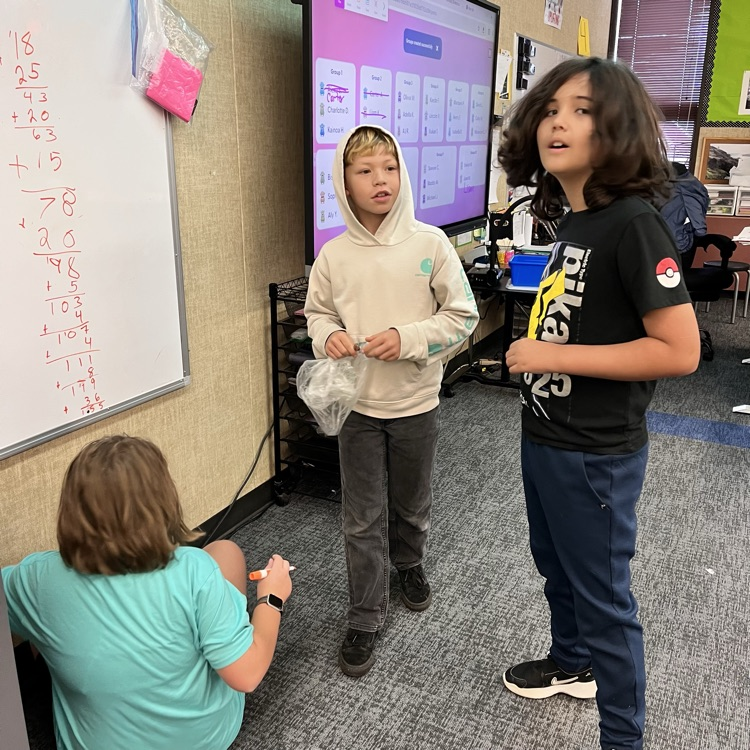 students play a math game