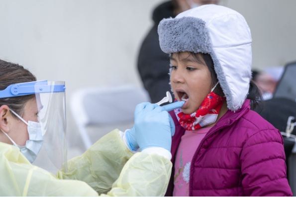 Picture of girl getting her teeth checked