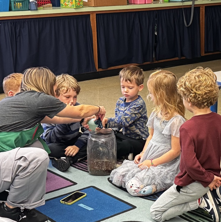 Kindergartners with a pumpkin 