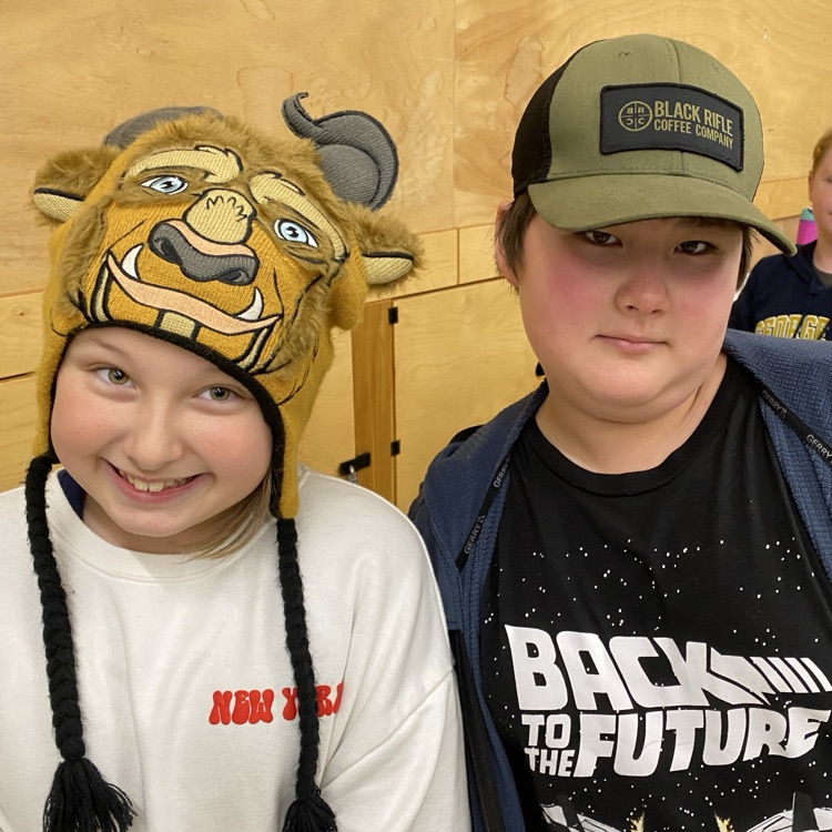 Students in hats and crazy hair.