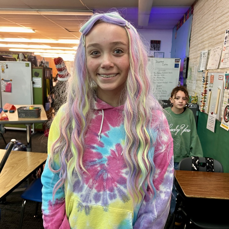 Students in hats and crazy hair.