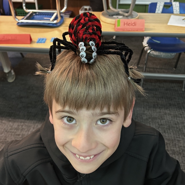 Students in hats and crazy hair.