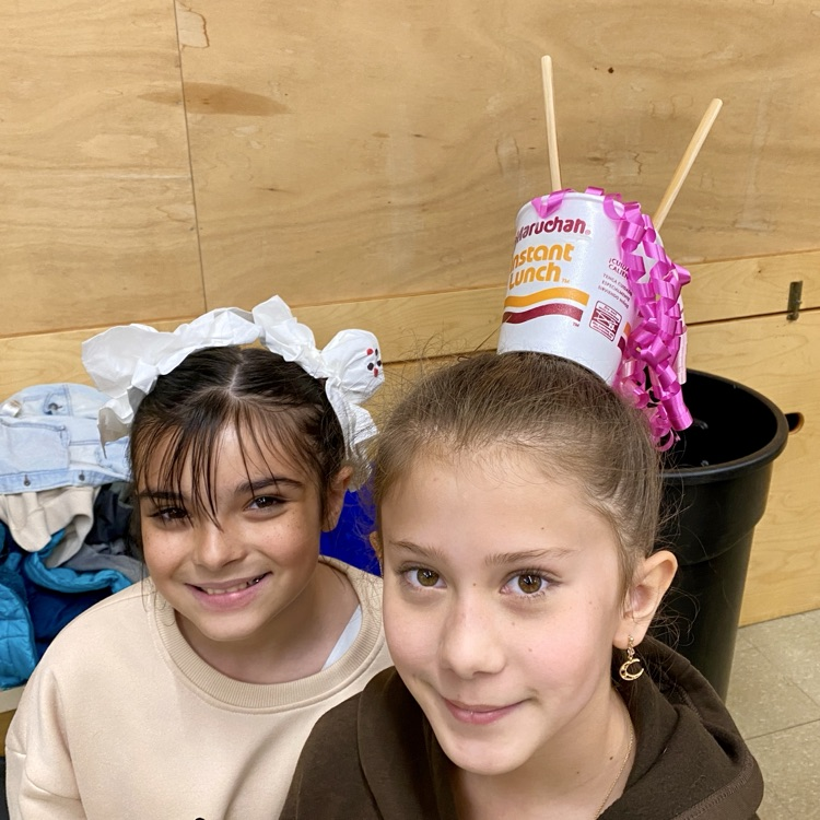 Students in hats and crazy hair.