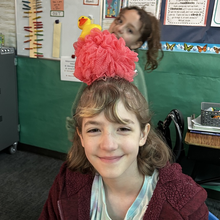 Students in hats and crazy hair.