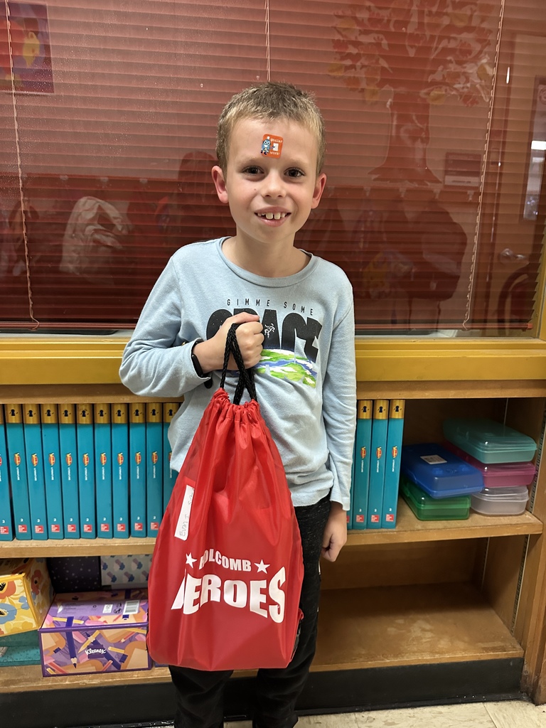 Student with jog-a-thon prize