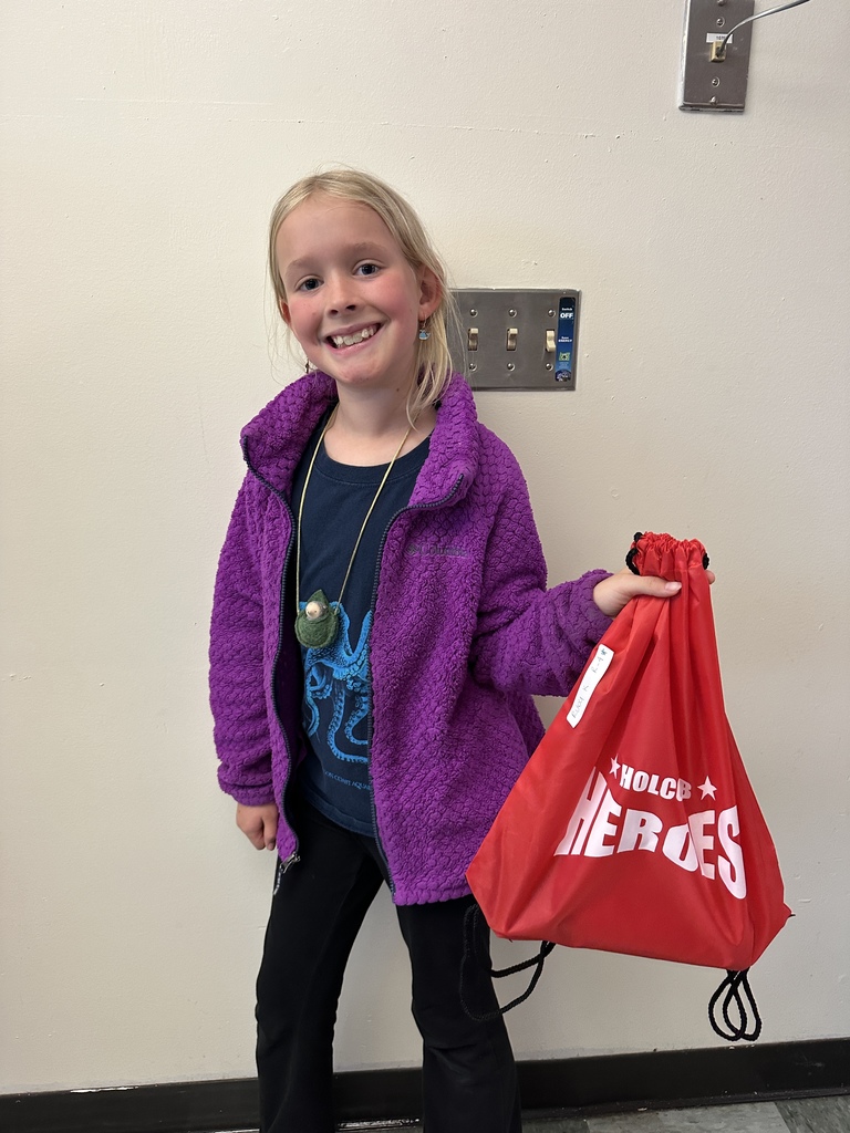 Student with jog-a-thon prize