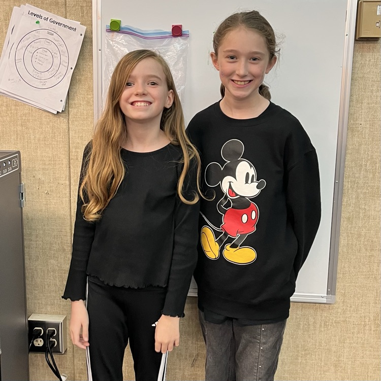 Students wearing black.