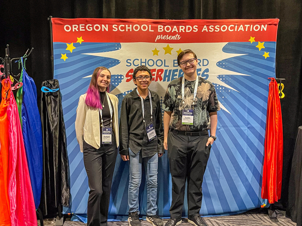 SSAC Students in front of a banner