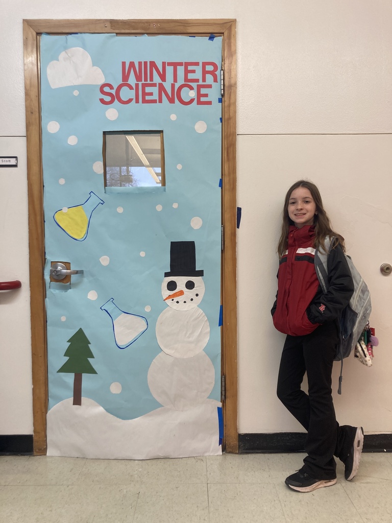 Let it snow creativity! ❄️ Ms. LaVoie’s students turned their classroom doors into winter masterpieces